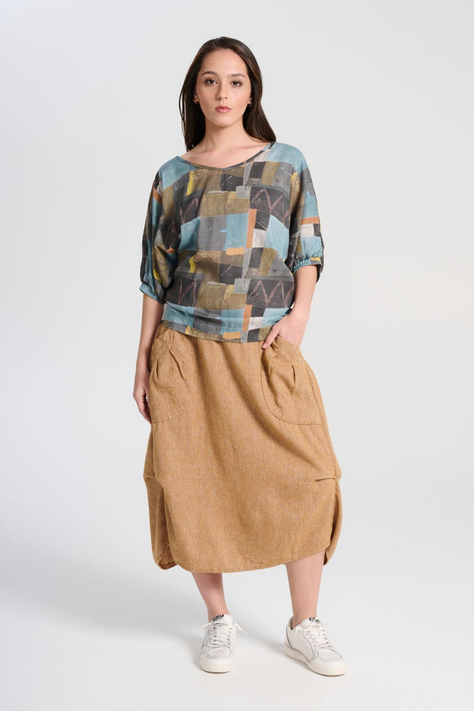 Olga de Polga Mustard Milwaukee Haven skirt in a wool/linen blend. Comfy waistband making it the perfect throw-on-and-go! Front view on model