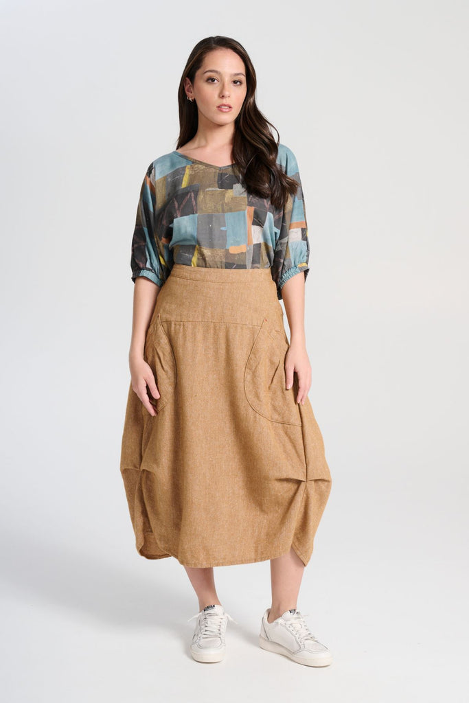 Olga de Polga Mustard Milwaukee Haven skirt in a wool/linen blend. Comfy waistband making it the perfect throw-on-and-go! Front full view on model