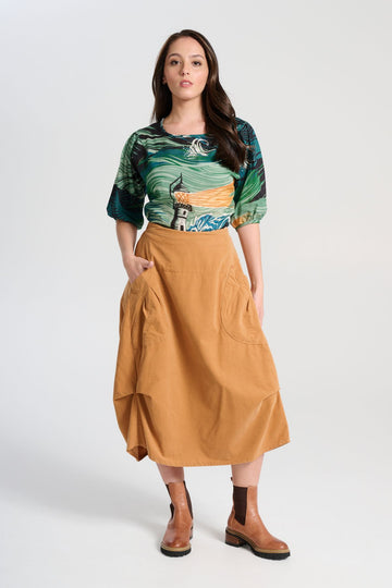 Olga de Polga Milwaukee Marlowe skirt in Mustard fine cotton cord. Comfy waistband making it the perfect throw-on-and-go! Front view on model
