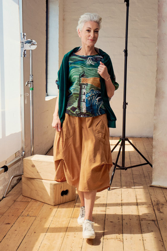 Olga de Polga Milwaukee Marlowe skirt in Mustard fine cotton cord. Comfy waistband making it the perfect throw-on-and-go!  Front full view on model