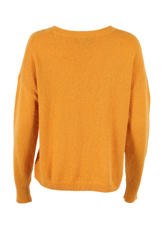 Olga de Polga Mustard Portland sweater in an angora/wool fabrication. With a round neck and slightly cropped length, the sweater has long sleeves. Back