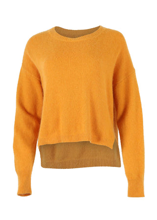 Olga de Polga Mustard Portland sweater in an angora/wool fabrication. With a round neck and slightly cropped length, the sweater has long sleeves.  Front