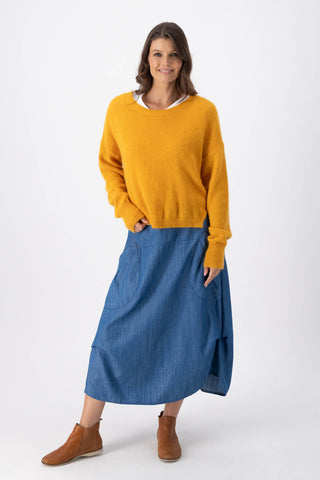 Olga de Polga Mustard Portland sweater in an angora/wool fabrication. With a round neck and slightly cropped length, the sweater has long sleeves.  Full front view
