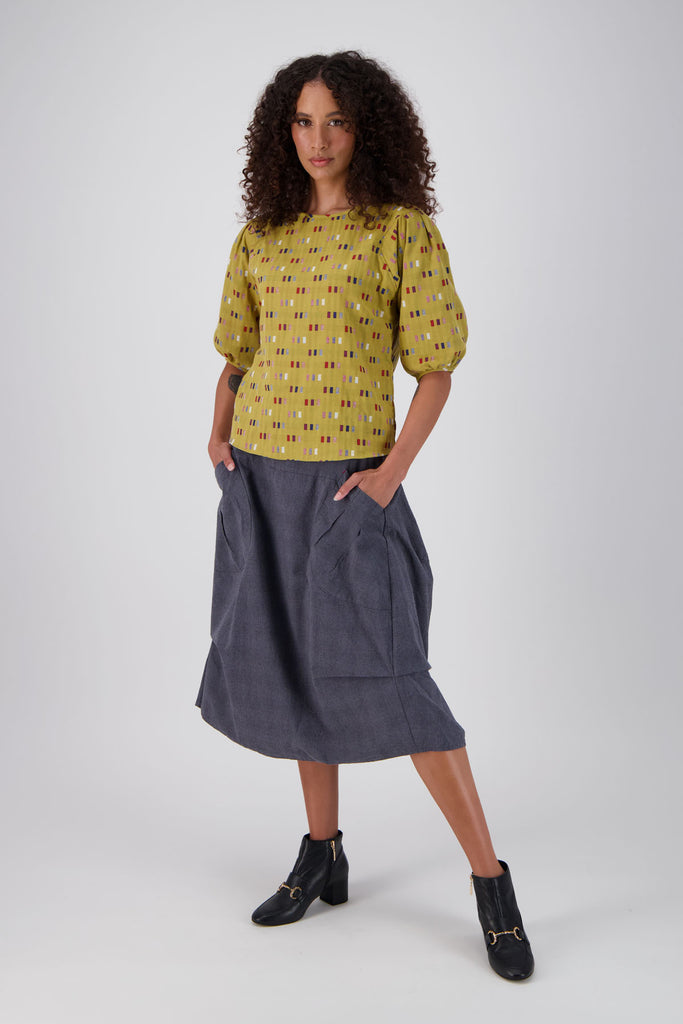 Olga de Polga Mustard Telegraph Blouse in woven cotton.  Full length view on model.