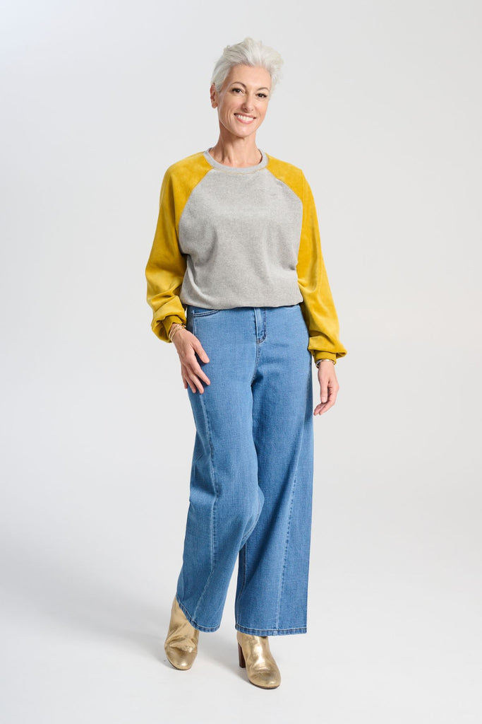 Olga de Polga Mustard and grey Odessa Sweatshirt in soft cotton velvet.  Full front view on model
