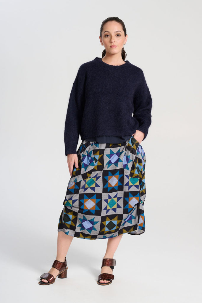 Olga de Polga Aspen knit sweater in Navy alpaca. Front full length view on model