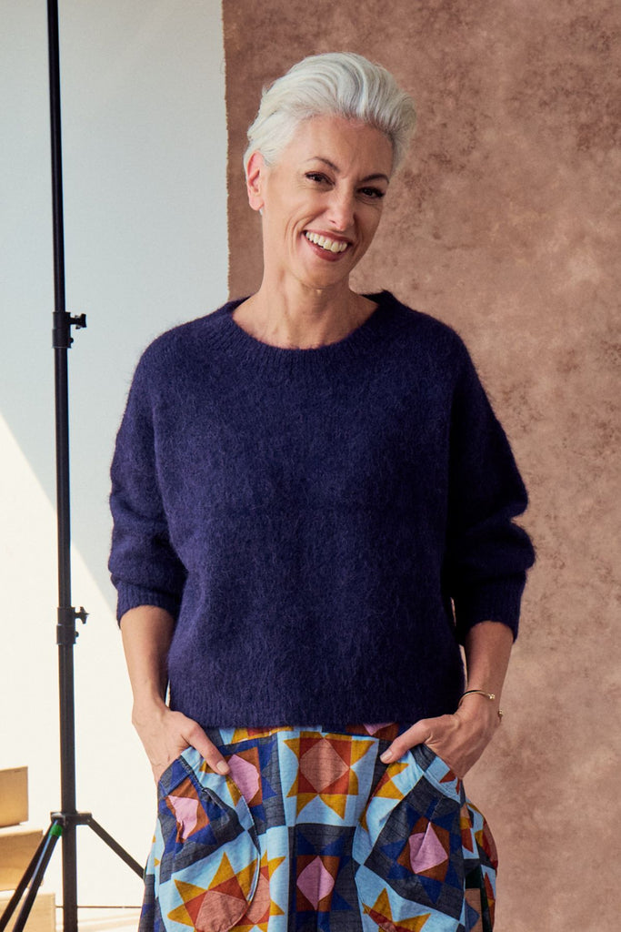Olga de Polga Aspen knit sweater in Navy alpaca.  Front close-up view on model