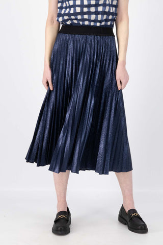 Olga de Polga Navy Champagne pleated skirt in 100% recycled polyester. Front view on model.