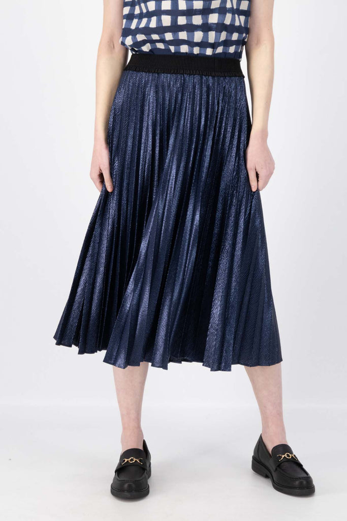 Olga de Polga Navy Champagne pleated skirt in 100% recycled polyester. Front view on model.