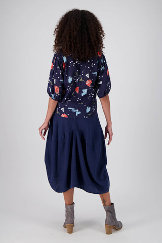 Olga de Polga Milwaukee Fiesta skirt in Navy. 100% Slub Linen skirt. Back full length view on model