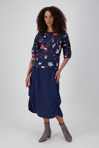 Olga de Polga Milwaukee Fiesta skirt in Navy. 100% Slub Linen skirt. Front full length view on model.