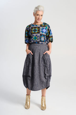 Olga de Polga Navy Milwaukee skirt in Haven wool/linen. Our Milwaukee Haven Skirt in the Navy wool/linen blend is an incredibly unique, chic and original skirt. It is universally flattering, highly versatile, and super comfortable. Front view on model