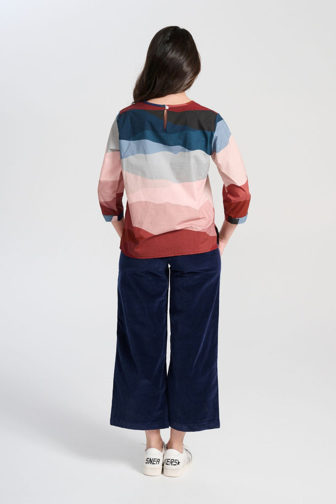 Olga  de Polga Peggy Pants Navy in soft velvet for the AW25 Odyssey collection. Cropped, wide leg. Large patch pockets. Back view on model.