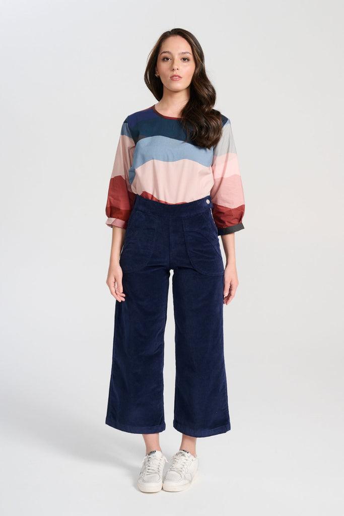 Olga  de Polga Peggy Pants Navy in soft velvet for the AW25 Odyssey collection. Cropped, wide leg. Large patch pockets. Front full length view on model.