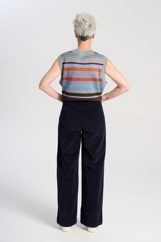 Olga de Polga Navy Peggy Sue Long velvet cotton cord pants. Wide leg. Large patch pockets. Full length. Back view on model