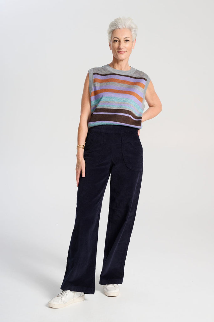 Olga de Polga Navy Peggy Sue Long velvet cotton cord pants. Wide leg. Large patch pockets. Full length.  Full front view on model