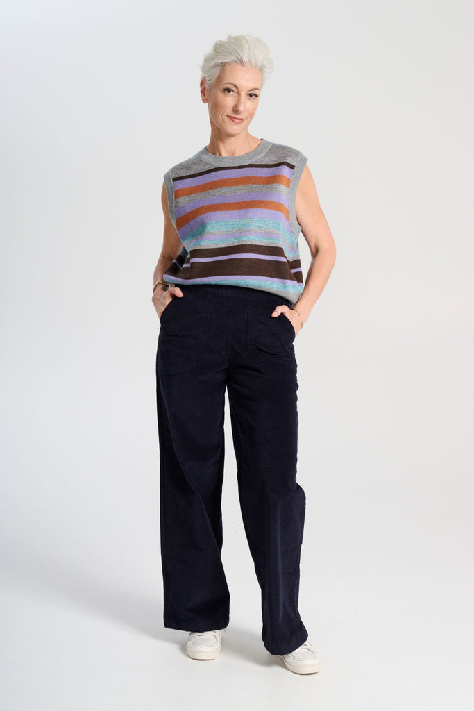 Olga de Polga Navy Peggy Sue Long velvet cotton cord pants. Wide leg. Large patch pockets. Full length. Front view on model.