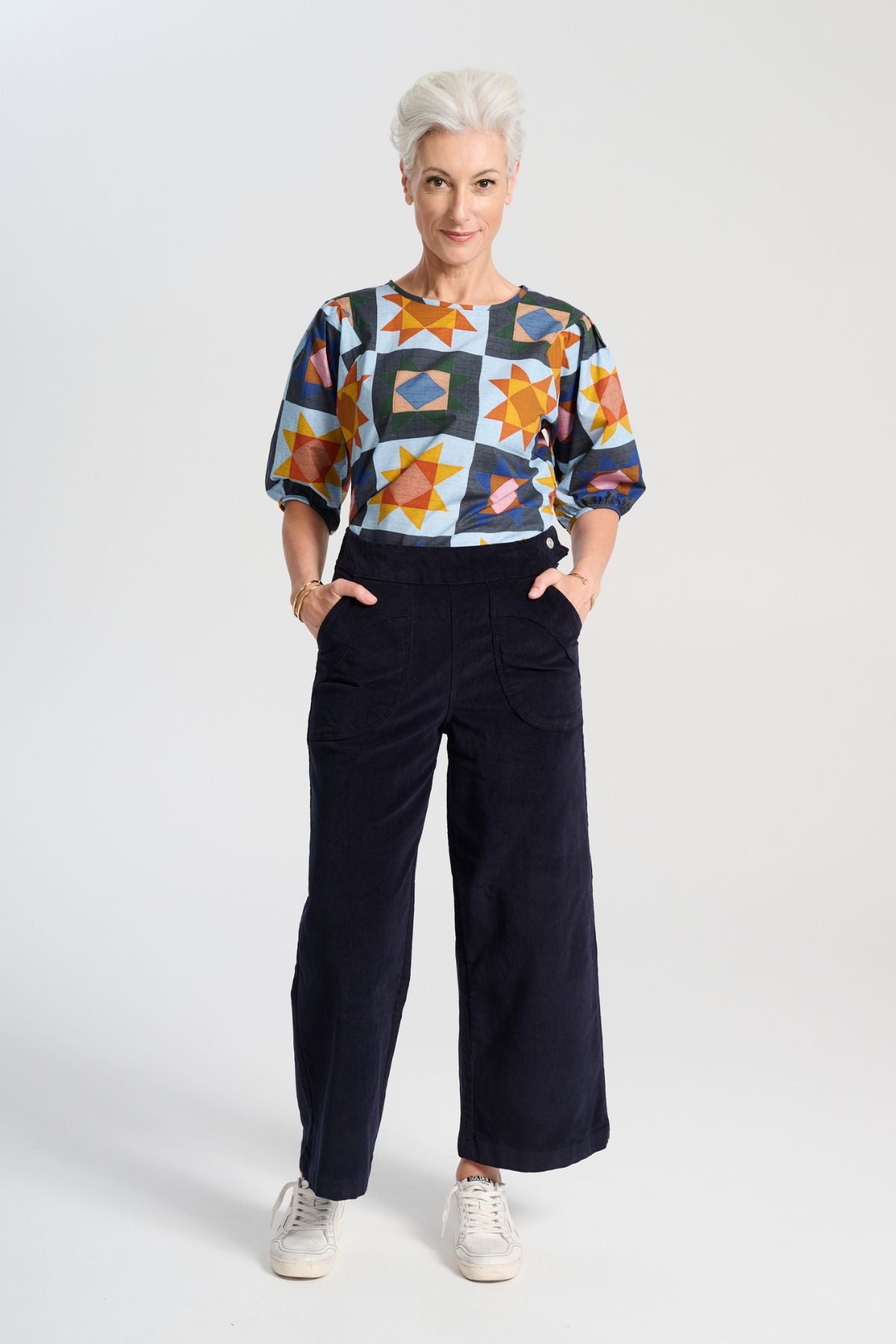 Olga de Polga Peggy Sue Pants cropped, in navy cotton velvet corduroy. Wide legged. Large patch pockets. Front view on model
