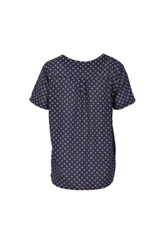 Olga de Polga navy polka dot top with short sleeves and a round neckline. Back view