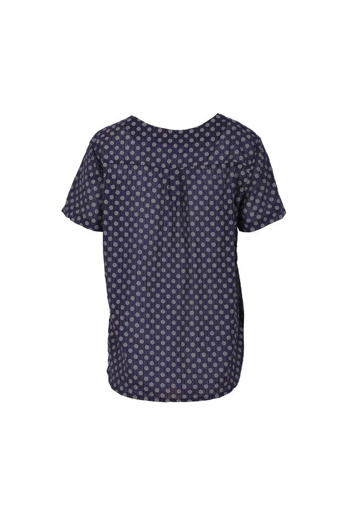 Olga de Polga navy polka dot top with short sleeves and a round neckline. Back view