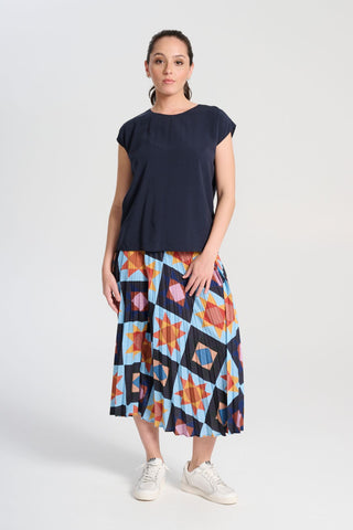 Olga de Polga Navy tencel Rhea tee. With a round neckline and cap sleeves this tee is perfect for all occasions. Button fastening at back neck. Front full length view