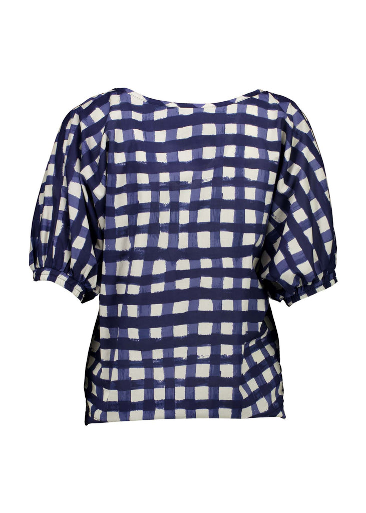 Olga de Polga Camisa blouse in the Rosa Navy print. Printed woven cotton. 100% Cotton. Reversible top to have either a boatneck or a soft V-neckline. Half sleeves with elasticated cuff. Back view.