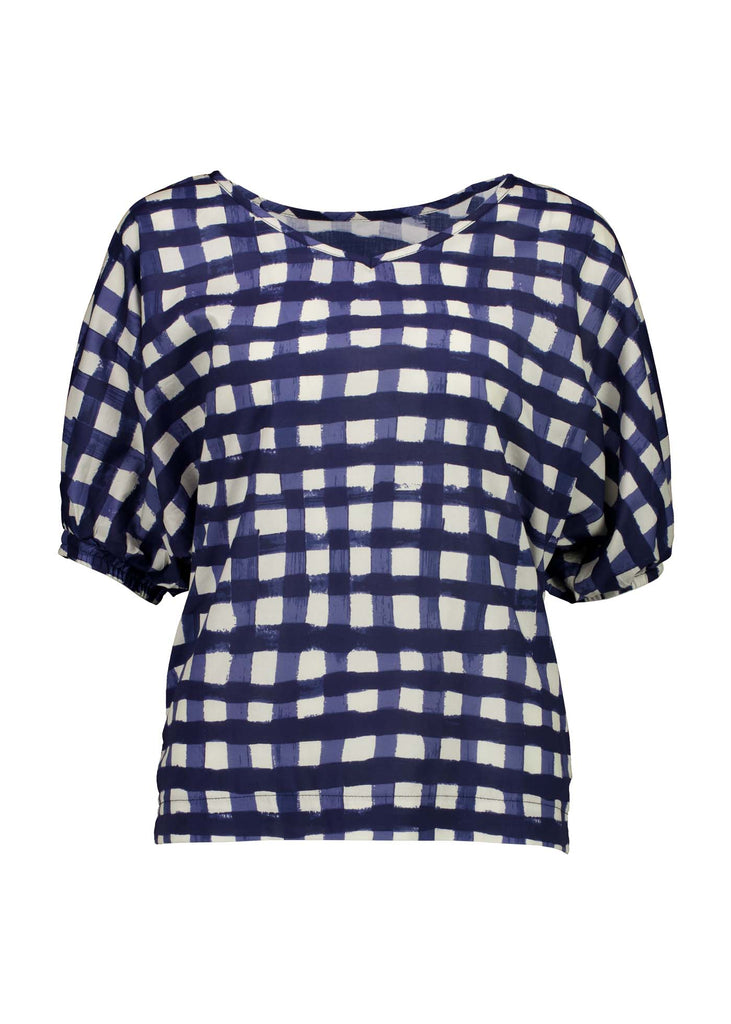 Olga de Polga Camisa blouse in the Rosa Navy print. Printed woven cotton. 100% Cotton. Reversible top to have either a boatneck or a soft V-neckline. Half sleeves with elasticated cuff. Front view.