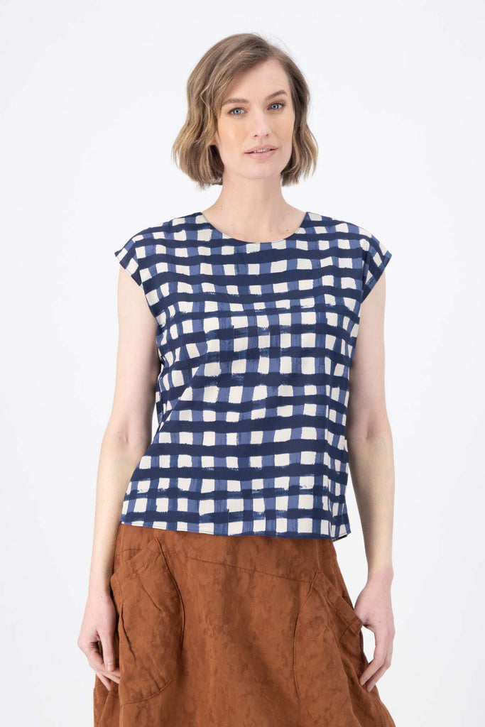 Olga de Polga classic cotton tee in Navy Rosa print. Crew neck and cap sleeves. Back neck opening. Front view on model.