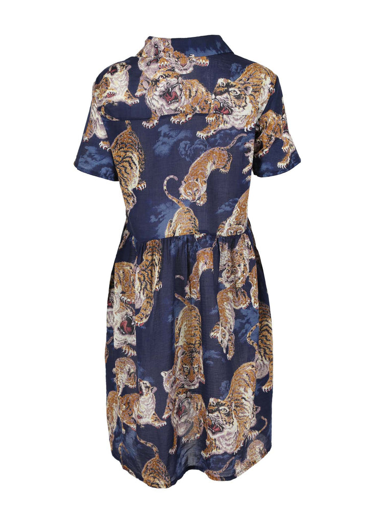 Olga de Polga Villa Drop Waist Dress in our 99 Tigers printed Cotton Seersucker in Navy Blue. Shirt dress with short sleeves. Finishes below the knee.  Back view