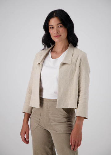 Olga de Polga Esprit Blazer in Oat linen. Cropped sleeves and collar with no button fastening. Front view