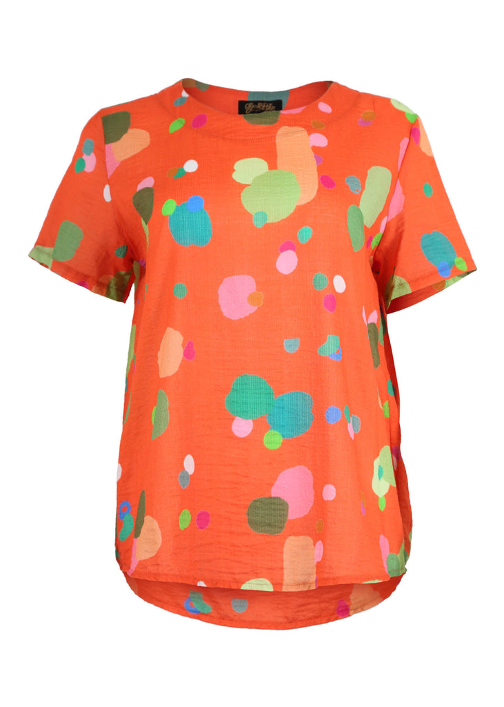 Olga de Polga Top in Orange Astra printed cotton seersucker fabric. With a round neckline and short sleeves, this top finishes at the hip. Front view