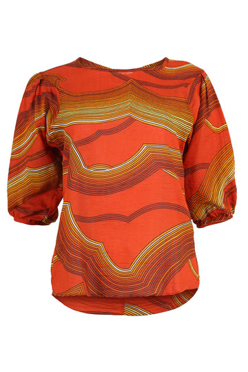Olga de Polga classic blouse in Orange Aurora printed cotton seersucker. With a round neckline and half sleeves this blouse finishes at the hip. Front view.