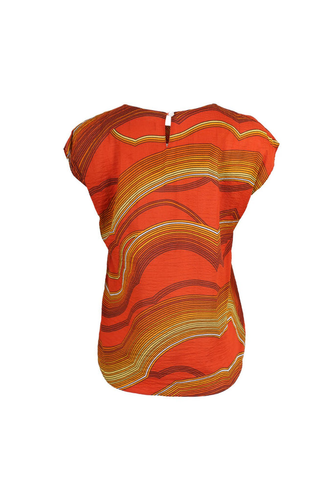 Olga de Polga classic tee in Orange Aurora printed cotton seersucker. With a round neckline and cap sleeves, this tee finishes at the hip. Front view.Olga de Polga classic tee in Orange Aurora printed cotton seersucker. With a round neckline and cap sleeves, this tee finishes at the hip. Front view.Olga de Polga classic tee in Orange Aurora printed cotton seersucker. With a round neckline and cap sleeves, this tee finishes at the hip. Back view