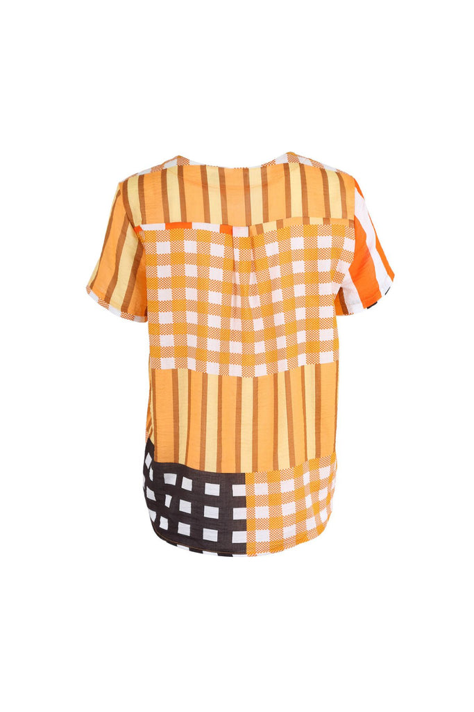 Olga de Polga Orange Central Park top. Back view