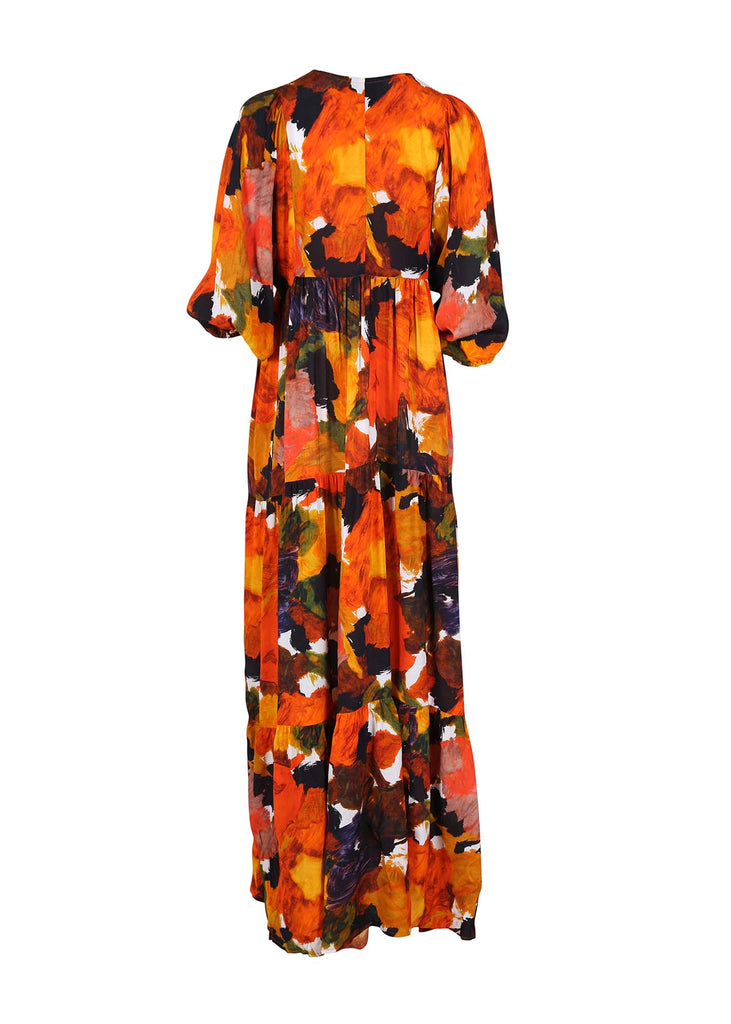 Olga de Polga Fiorella Orange Olivia Dress in viscose crepe.Maxi dress with half sleeves and buttons at the front down to the waist seam. Round neckline. A-line tiered skirt in a drapey fabric. Back view