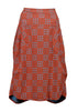 Olga de Polga Milwaukee skirt in Network Orange printed cotton. The Milwaukee is an incredibly unique, chic and original skirt. It is universally flattering, highly versatile, and super comfortable. Perfect to throw on and go. Front view.