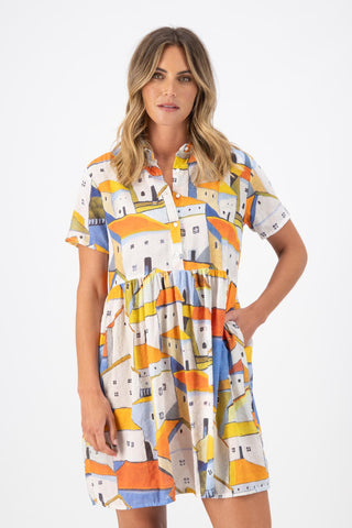 Olga de Polga Pueblito Orange villa dress in cotton seersucker fabric. Front close view on model.