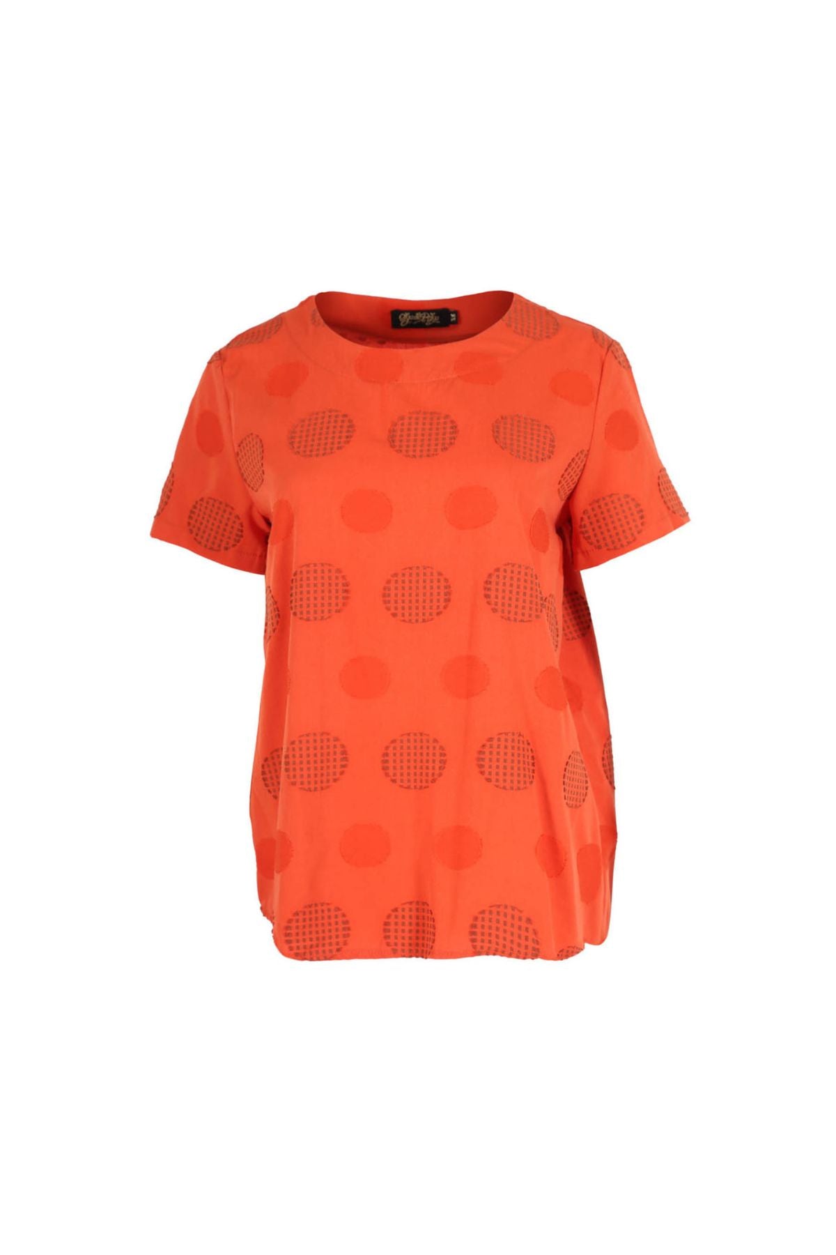 Olga de Polga Orange Universal top with a woven pattern of textured circles in the same orange. Front view