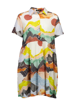 Olga de Polga Villa dress with a dropped waist in Vista Orange printed cotton seersucker. Front view.