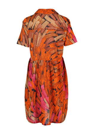 Olga de Olga Villa drop waist dress in Orange Vivant printed cotton seersucker. With a collar button up front going down to the waist, and short sleeves, this dress finishes below the knee.  Back view