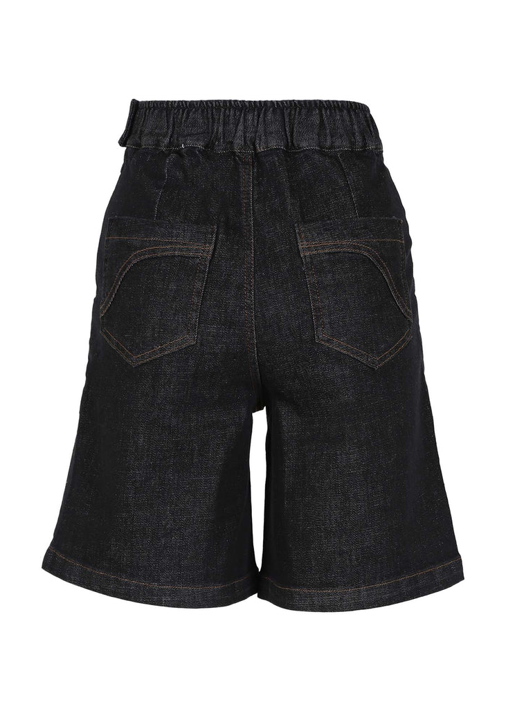 Olga de Polga Denim Peggy Shorts in Black Wash. Oversized front pockets. Sits above the knee, able to be rolled up for different lengths. Back view