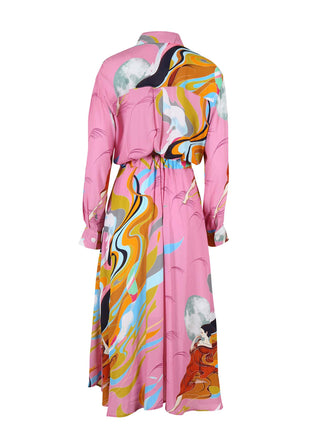 Olga de Polga Parisian dress with long sleeves and collar with a v-neck front. In Pink faith printed lustrous viscose. Elasticated back waist. Back view.