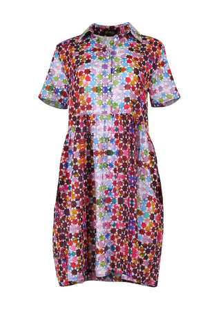 Olga de Polga Villa drop waist dress in Pink Kaleidoscope printed cotton seersucker. Front view