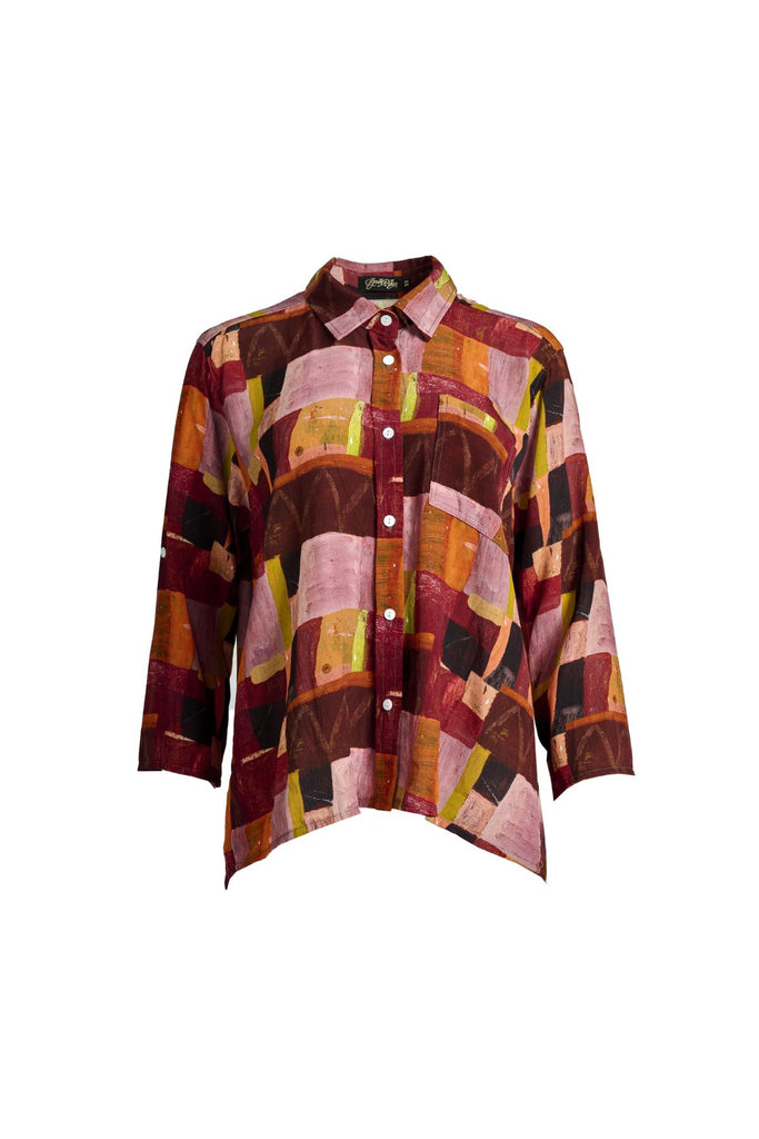 Olga de Polga classic shirt in printed viscose. Kismet Blush Print. Button down front, 3/4 sleeves and a front patch pocket. Print has colours of red, pink, burgundy and accents of yellow and orange. Front view