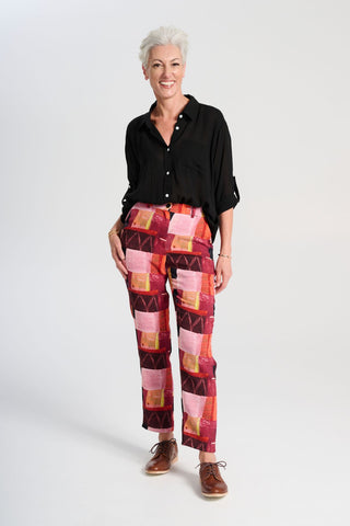 Olga de Polga Printed Pantalon pants in Kismet Blush. Front view on model.