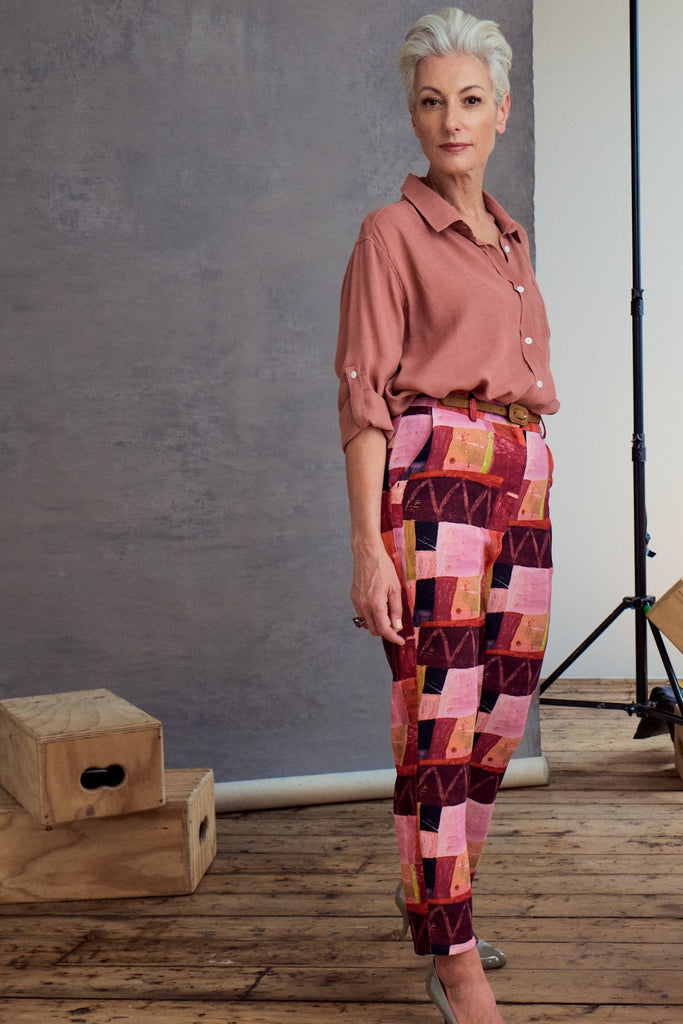 Olga de Polga Printed Pantalon pants in Kismet Blush. Side view on model, close-up.