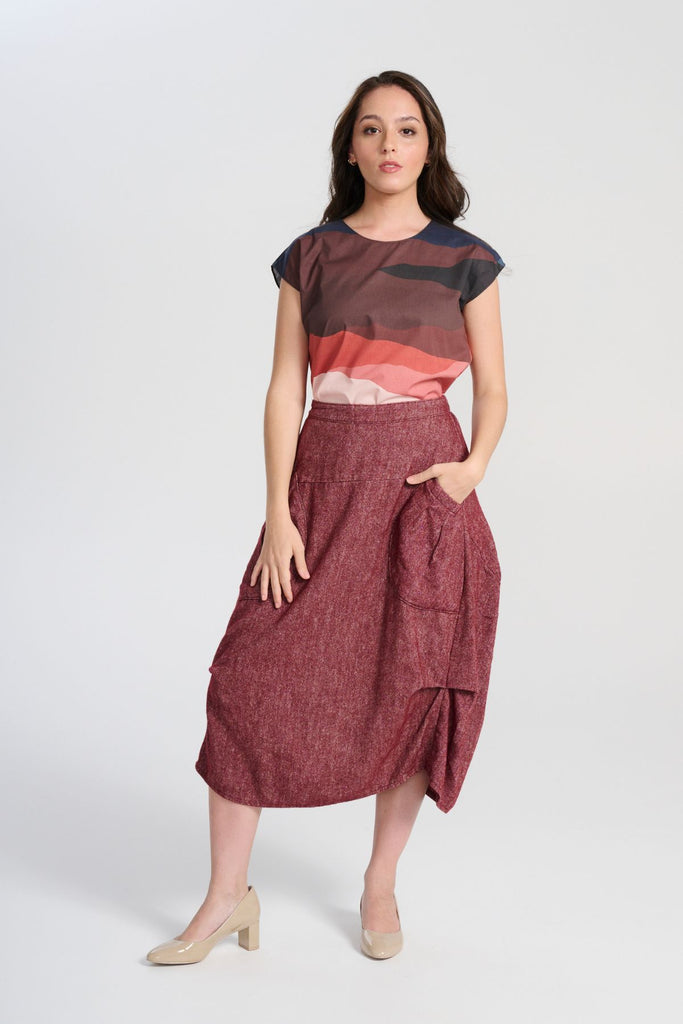 Olga de Polga New Kona printed cotton tee. Front full length view on model. Round neckline, cap sleeves, finishes at the hip. Full front view on model