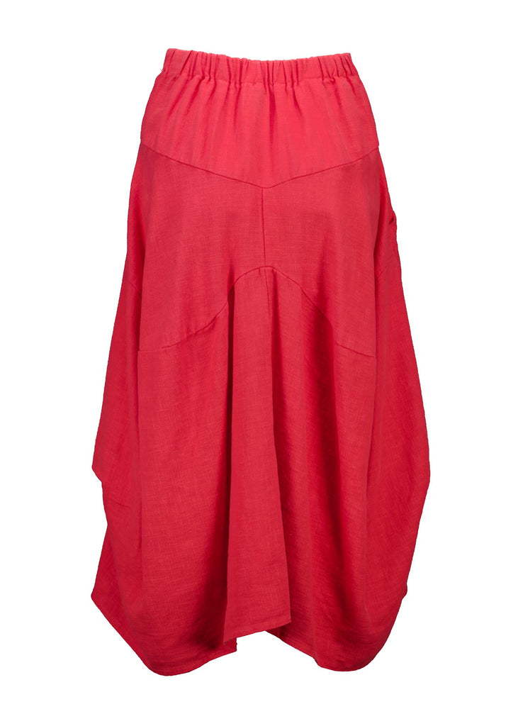 Olga de Polga Milwaukee Fiesta skirt in Watermelon Red.  Milwaukee Fiesta Skirt in 100% slub linen is an incredibly unique, chic and original skirt. It is universally flattering, highly versatile, and super comfortable. Perfect to throw on and go. Back view.