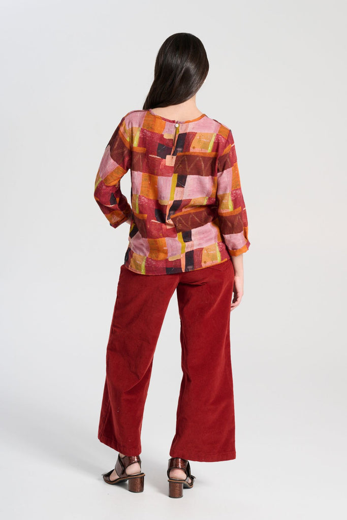 Olga de Polga Vino Peggy Sue Pants in soft velvet corduroy.  Also available in a long length.  Back view on model
