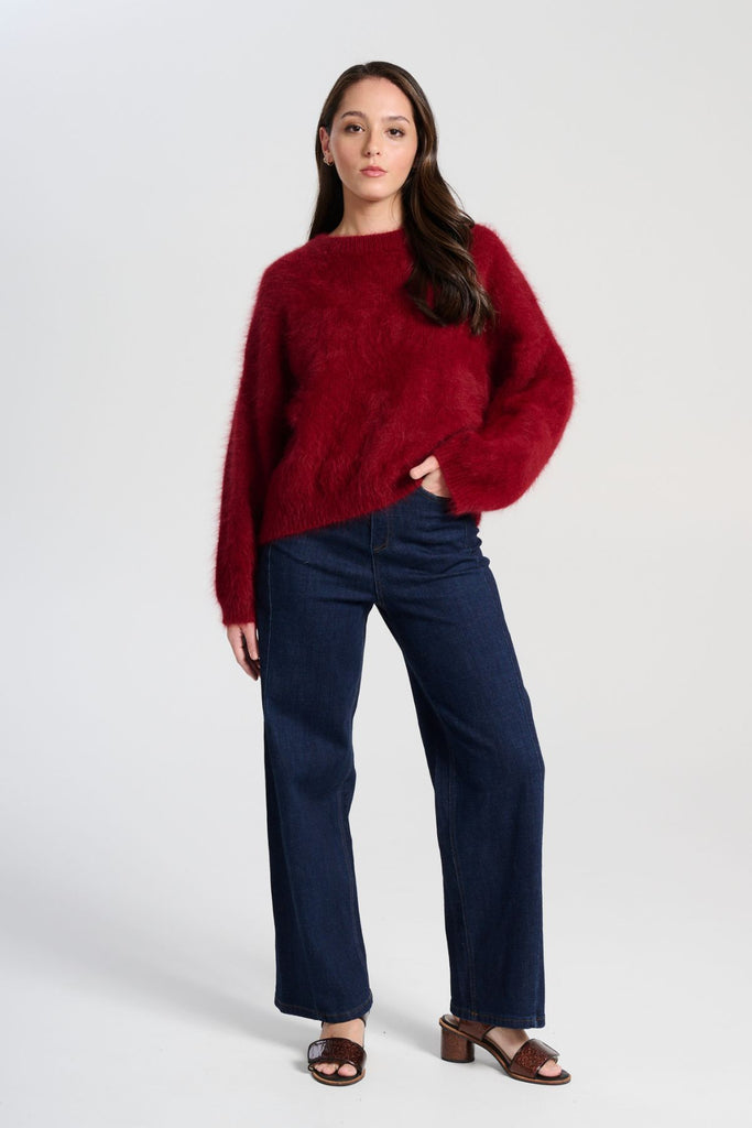 Crafted in an impossibly soft angora blend, this jumper will keep you warm on the greyest of days while still staying comfortable and light. Front full length view on model